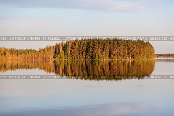Windless evening at the lake with island reflection on water surface. Karelia, Russia. Horizontal image. Стоковое фото, фотограф Кекяляйнен Андрей / Фотобанк Лори