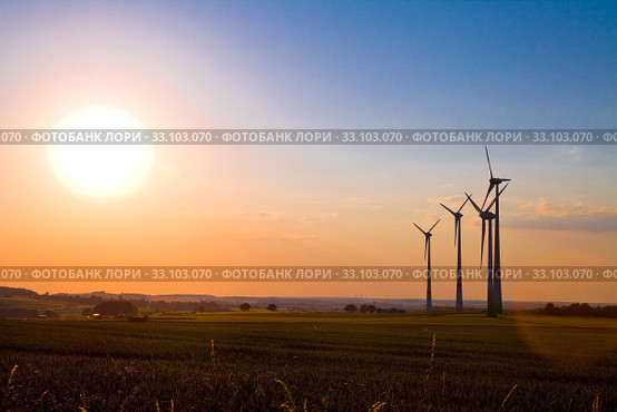 Windmills at sunset. Стоковое фото, фотограф Artur Wojteczek / PantherMedia / Фотобанк Лори