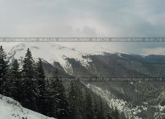 Winter landscape of Pirin mountains, Bansko ski resort in Bulgaria. Стоковое фото, агентство Ingram Publishing / Фотобанк Лори