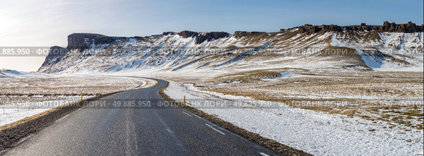 Winter Mountain range road in a sunny day at Vik, Southern of Iceland. Стоковое фото, агентство Ingram Publishing / Фотобанк Лори