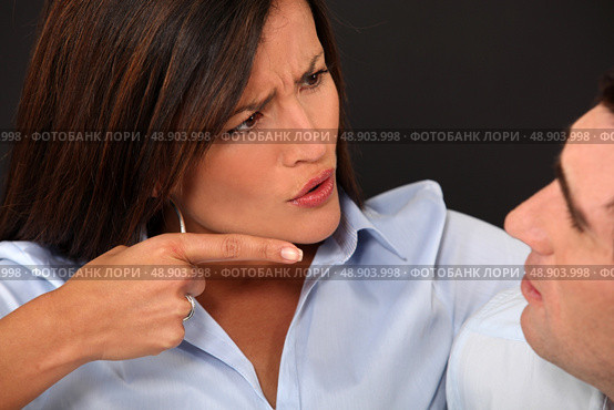 Woman blaming her husband. Стоковое фото, агентство Ingram Publishing / Фотобанк Лори