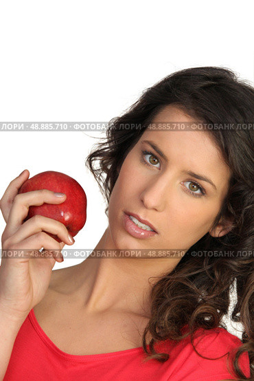 Woman displaying red apple. Стоковое фото, агентство Ingram Publishing / Фотобанк Лори