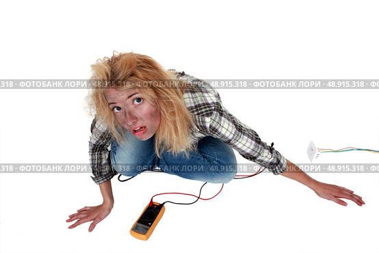 Woman having had an electric shock. Стоковое фото, агентство Ingram Publishing / Фотобанк Лори