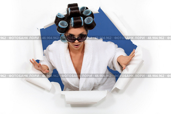 Woman in a bathrobe with her hair in rollers. Стоковое фото, агентство Ingram Publishing / Фотобанк Лори