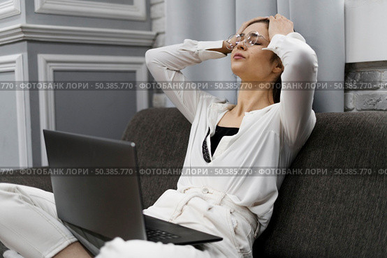 woman looking sad because unfinished project. Стоковое фото, агентство Ingram Publishing / Фотобанк Лори