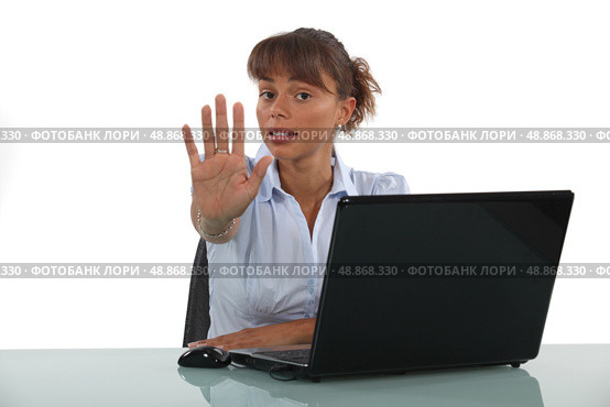 woman making a stop sigh with her hand. Стоковое фото, агентство Ingram Publishing / Фотобанк Лори