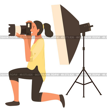 Woman photographer shooting with flash light, photoshoot in studio with spotlight. Happy female holding camera and focusing, taking photo, hobby vector. Photographing with Flash Light, Camera Vector. Стоковая иллюстрация, агентство Ingram Publishing / Фотобанк Лори