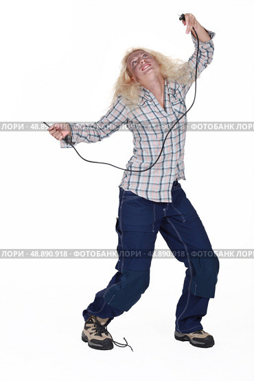 Woman suffering from electrocution. Стоковое фото, агентство Ingram Publishing / Фотобанк Лори
