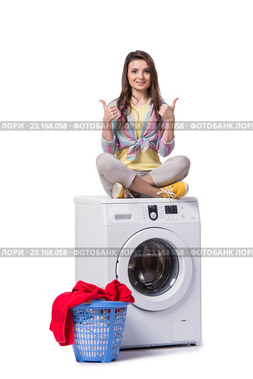 Woman tired after doing laundry isolated on white. Стоковое фото, фотограф Elnur / Фотобанк Лори