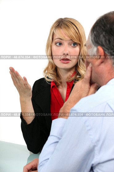 Woman trying to explain her point of view. Стоковое фото, агентство Ingram Publishing / Фотобанк Лори