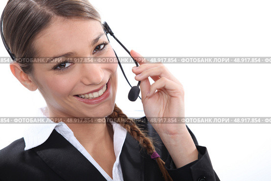 Woman with a headset. Стоковое фото, агентство Ingram Publishing / Фотобанк Лори