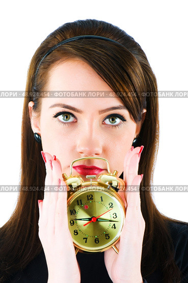 Woman with clock isolated on the white. Стоковое фото, агентство Ingram Publishing / Фотобанк Лори
