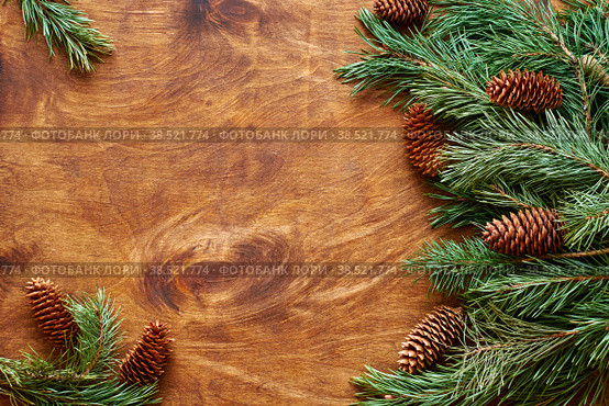 Wooden background with pine branches. New Year. Christmas. Rustic. Top view. Стоковое фото, фотограф Лютик Фалисова / Фотобанк Лори