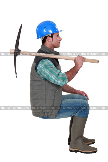 Worker with a pickaxe. Стоковое фото, агентство Ingram Publishing / Фотобанк Лори