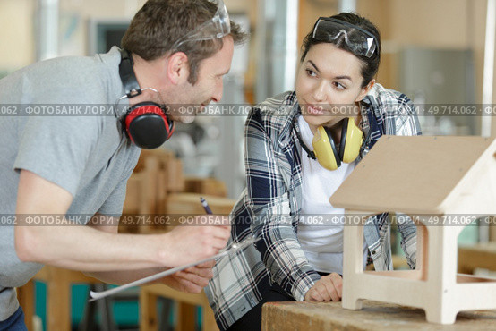 working on a wood piece. Стоковое фото, агентство Ingram Publishing / Фотобанк Лори