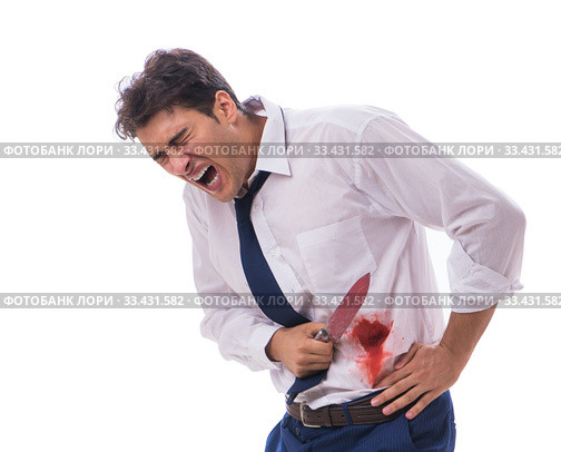 Wounded businessman with blood stains isolated on white backgrou. Стоковое фото, фотограф Elnur / Фотобанк Лори