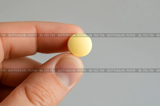 Yellow ball balanced on a fingertip against a dark background during daylight. Стоковое AI-изображение, AI-художник Юлия Гапеенко / Фотобанк Лори