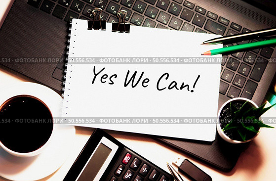 Yes we can! is written on white piece of paper. Be Brave Encouragement Time to Act Motivation Aspirations Concept. Стоковое фото, агентство Ingram Publishing / Фотобанк Лори