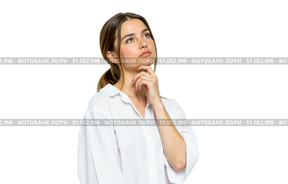 Young brunette woman in white shirt looking up with thoughtful expression, hand on chin, isolated on white background, thinking deeply, making decision. Стоковое AI-изображение, AI-художник Павел Муравьев / Фотобанк Лори