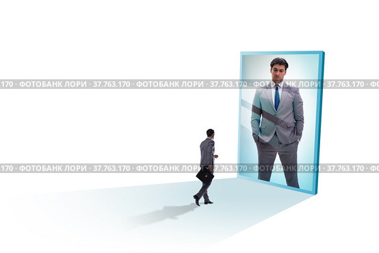 Young businessman in alter ego concept. Стоковое фото, фотограф Elnur / Фотобанк Лори