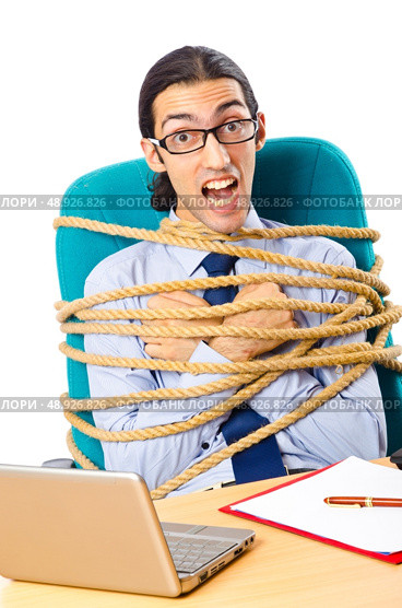 Young businessman tied with rope. Стоковое фото, агентство Ingram Publishing / Фотобанк Лори
