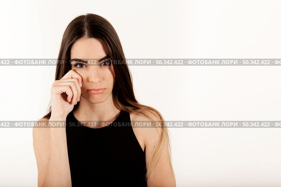 young female model crying. Стоковое фото, агентство Ingram Publishing / Фотобанк Лори