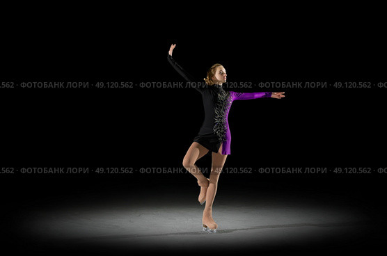 Young girl figure skater (half-isolated version) Стоковое фото, агентство Ingram Publishing / Фотобанк Лори