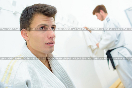 young men in martial arts uniform. Стоковое фото, агентство Ingram Publishing / Фотобанк Лори