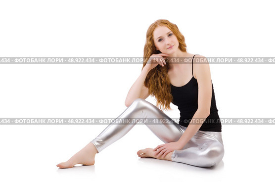 Young redhead girl in tight leggings. Стоковое фото, агентство Ingram Publishing / Фотобанк Лори