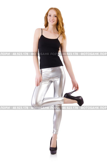Young redhead girl in tight leggings. Стоковое фото, агентство Ingram Publishing / Фотобанк Лори