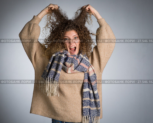 Young woman with curly hair. Стоковое фото, фотограф Типляшина Евгения / Фотобанк Лори