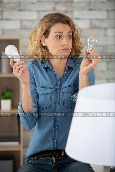 young worried woman thinking hard looking for right solution. Стоковое фото, агентство Ingram Publishing / Фотобанк Лори